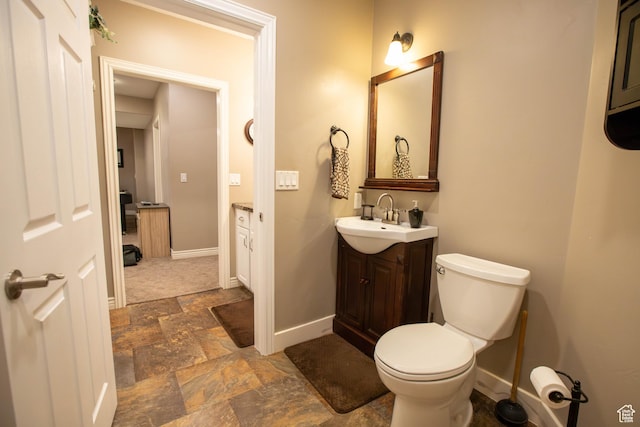 954 E 960 S, Ephraim, UT 84627 - bathroom with stone finish floors, baseboards, vanity, and toilet