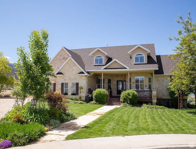 954 E 960 S, Ephraim, UT 84627 - view of front of home with stone siding, a front yard, a porch, and roof with shingles