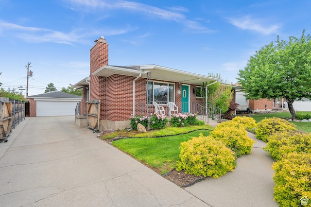 475 E 6815 S, Midvale, UT 84047 - single story home featuring brick siding, a chimney, an outbuilding, and a garage