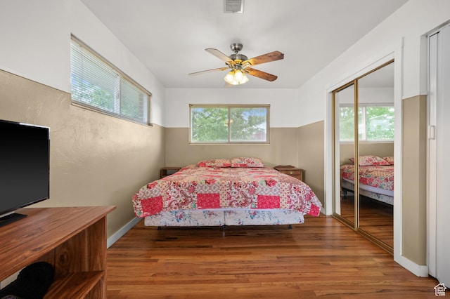 475 E 6815 S, Midvale, UT 84047 - bedroom with wood finished floors, a closet, and ceiling fan