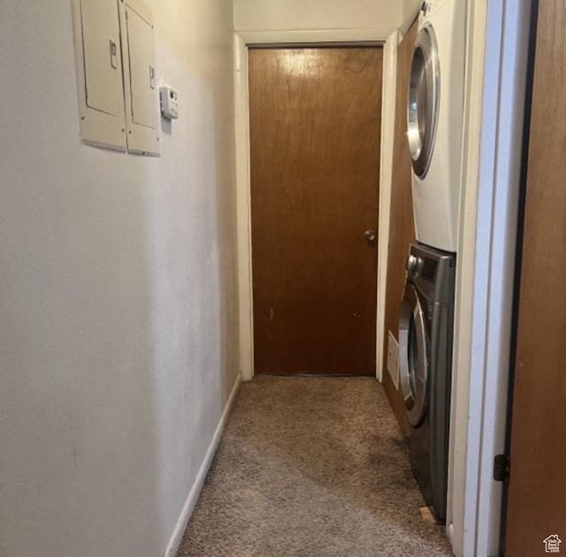 631 N 1150 W, Provo, UT 84601 - washroom featuring stacked washer / dryer, carpet flooring, electric panel, and baseboards