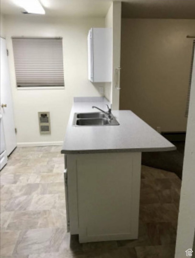 631 N 1150 W, Provo, UT 84601 - kitchen featuring a sink and baseboards