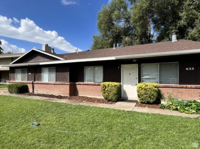 631 N 1150 W, Provo, UT 84601 - single story home with brick siding and a front lawn