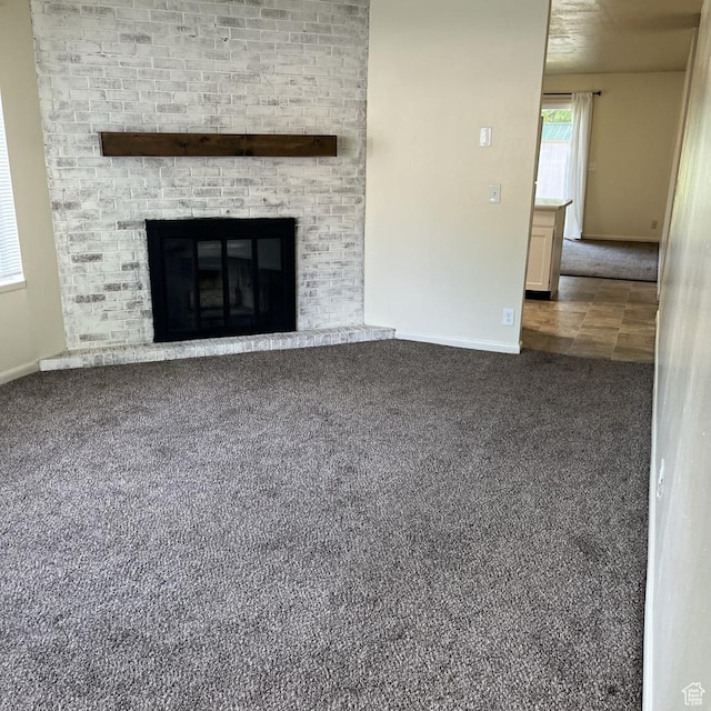 631 N 1150 W, Provo, UT 84601 - unfurnished living room featuring carpet flooring and a fireplace