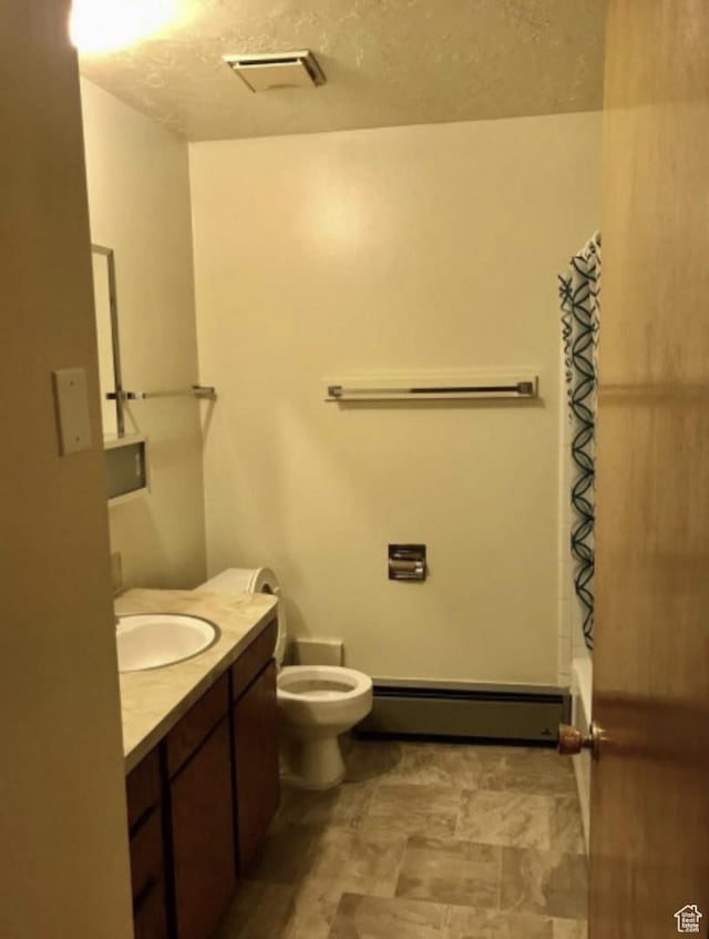 631 N 1150 W, Provo, UT 84601 - full bath with baseboard heating, toilet, vanity, and shower / bathtub combination with curtain