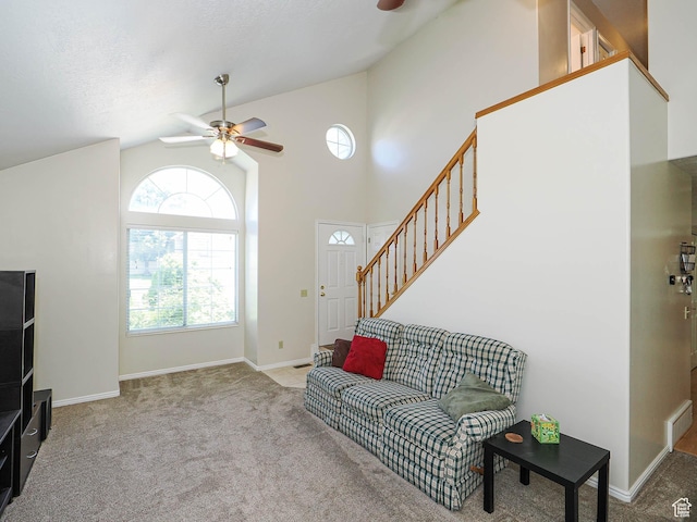1090 E 2125 N, Layton, UT 84041 - living room with a ceiling fan, stairs, carpet, high vaulted ceiling, and baseboards