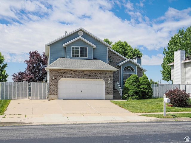 1090 E 2125 N, Layton, UT 84041 - traditional-style house with a garage, driveway, brick siding, and a gate