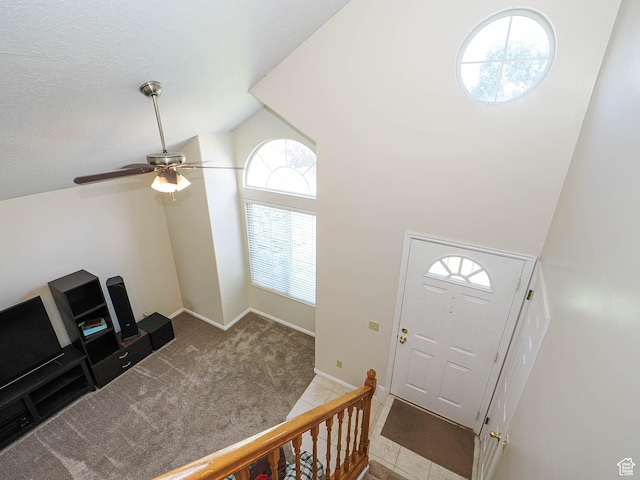 1090 E 2125 N, Layton, UT 84041 - foyer entrance featuring lofted ceiling, ceiling fan, carpet floors, and baseboards
