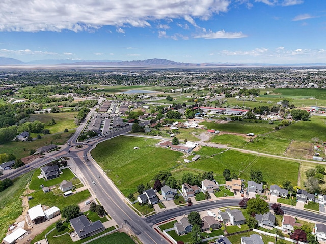 1090 E 2125 N, Layton, UT 84041 - aerial view of property's location featuring a mountainous background and nearby suburban area