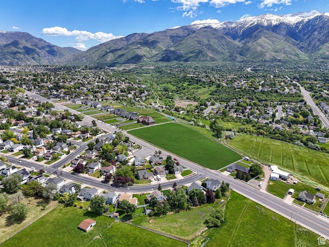 1090 E 2125 N, Layton, UT 84041 - aerial overview of property's location with mountains and nearby suburban area