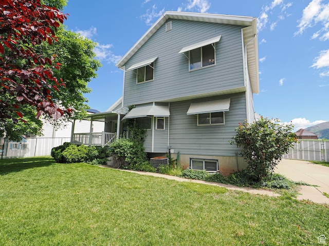 1090 E 2125 N, Layton, UT 84041 - back of house featuring concrete driveway and central AC