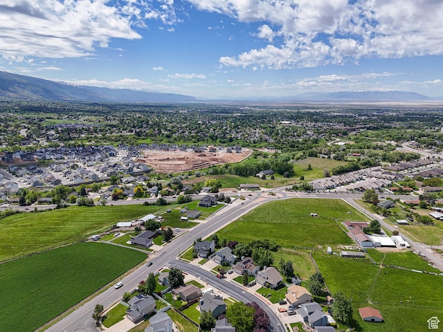 1090 E 2125 N, Layton, UT 84041 - aerial view of property's location with a mountain backdrop and nearby suburban area