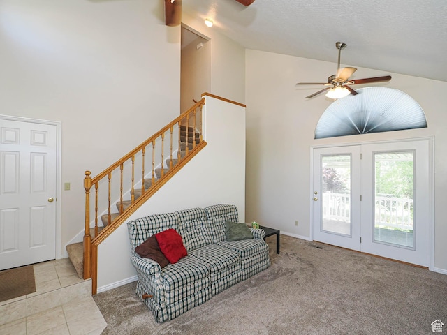 1090 E 2125 N, Layton, UT 84041 - carpeted living room with ceiling fan, stairs, high vaulted ceiling, and baseboards