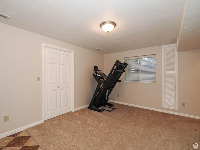1090 E 2125 N, Layton, UT 84041 - exercise room featuring baseboards, a textured ceiling, and carpet floors