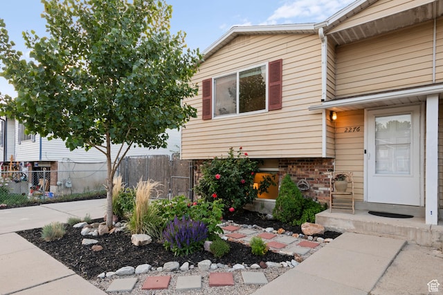 2276 W Bonniebrook Cir S, Taylorsville, UT 84129 - property entrance featuring brick siding