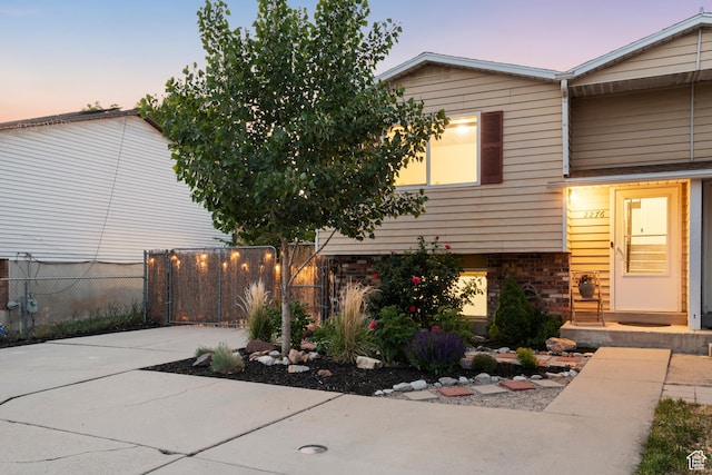 2276 W Bonniebrook Cir S, Taylorsville, UT 84129 - view of property exterior with brick siding