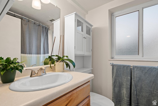 2276 W Bonniebrook Cir S, Taylorsville, UT 84129 - full bath with vanity, toilet, and curtained shower
