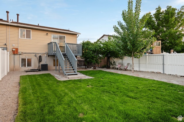 2276 W Bonniebrook Cir S, Taylorsville, UT 84129 - back of house with cooling unit and stairway