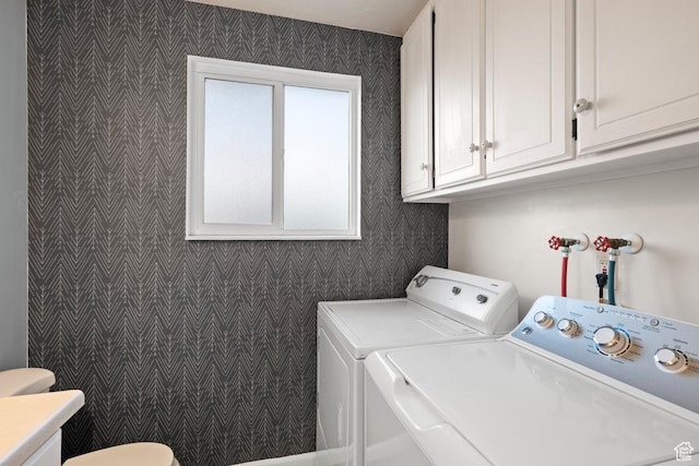 2276 W Bonniebrook Cir S, Taylorsville, UT 84129 - laundry area with washer and clothes dryer and wallpapered walls