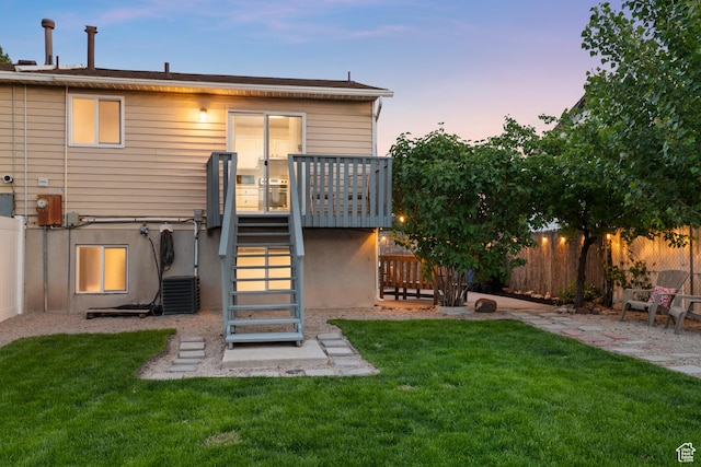 2276 W Bonniebrook Cir S, Taylorsville, UT 84129 - back of property at dusk featuring stairs