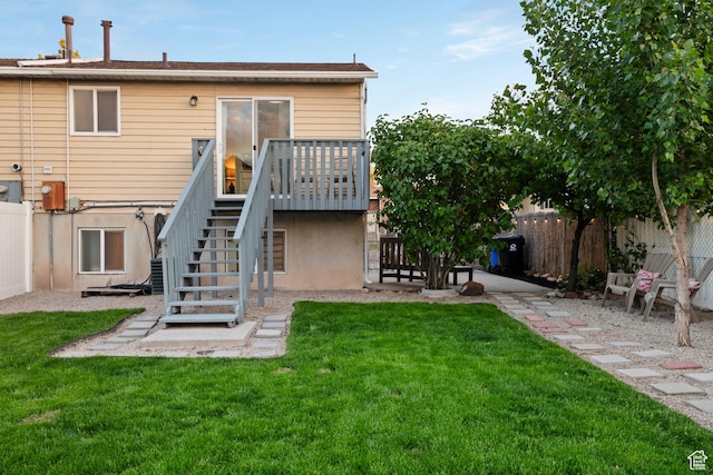 2276 W Bonniebrook Cir S, Taylorsville, UT 84129 - rear view of property featuring stairway and a deck