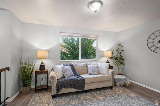 2276 W Bonniebrook Cir S, Taylorsville, UT 84129 - living room featuring wood finished floors and baseboards