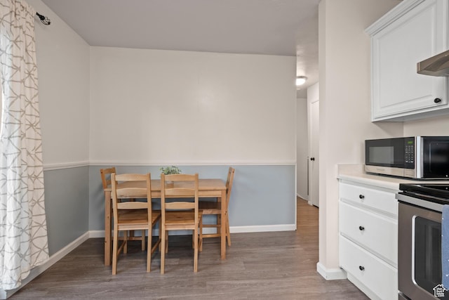 2276 W Bonniebrook Cir S, Taylorsville, UT 84129 - dining space featuring wood finished floors and baseboards