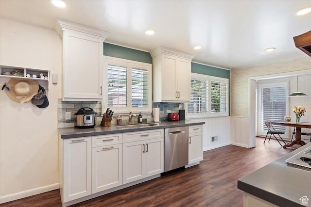 2377 S 150 E, Bountiful, UT 84010 - kitchen featuring appliances with stainless steel finishes, a sink, dark countertops, dark wood finished floors, and white cabinetry