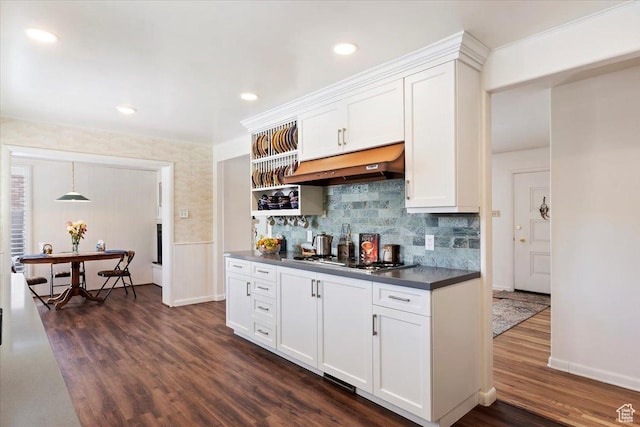 2377 S 150 E, Bountiful, UT 84010 - kitchen with under cabinet range hood, stainless steel gas cooktop, dark countertops, dark wood-style floors, and recessed lighting