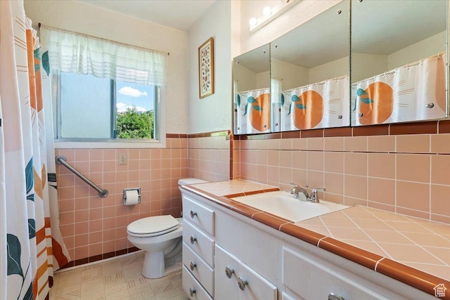 2377 S 150 E, Bountiful, UT 84010 - full bathroom with toilet, vanity, tile walls, and wainscoting