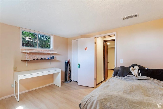 2377 S 150 E, Bountiful, UT 84010 - bedroom with light wood finished floors, baseboards, and a desk