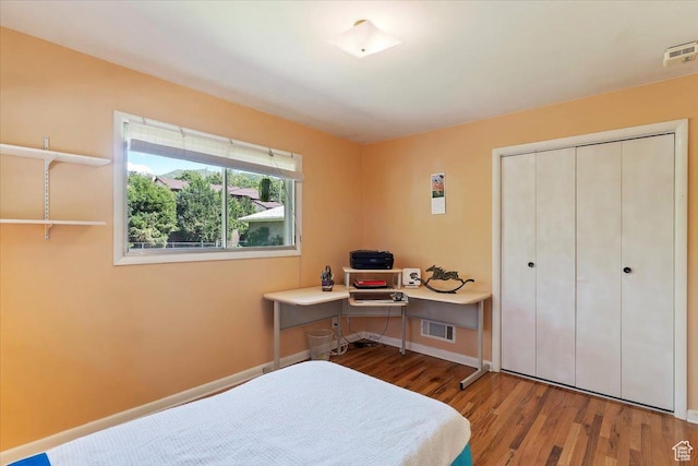 2377 S 150 E, Bountiful, UT 84010 - bedroom with wood finished floors, a closet, and baseboards