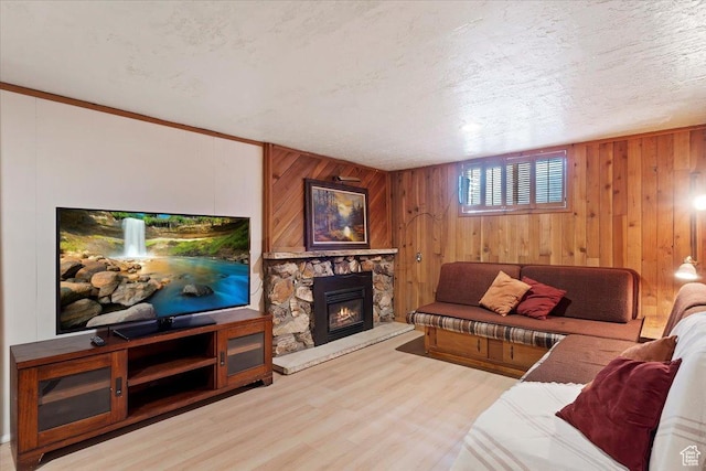 2377 S 150 E, Bountiful, UT 84010 - living room with a fireplace, wood finished floors, and wood walls