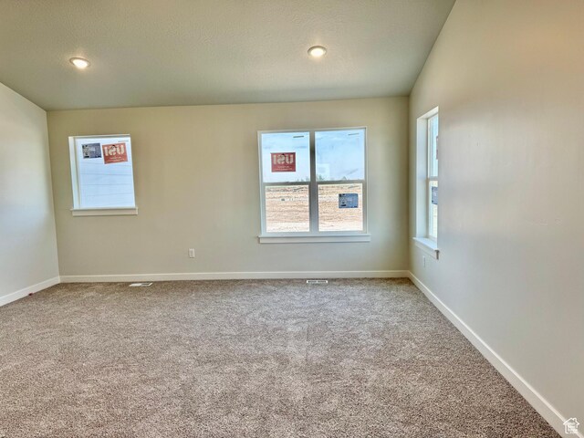 3807 W 1780 S Unit 213, Taylor, UT 84401 - carpeted spare room featuring baseboards, recessed lighting, and a textured ceiling