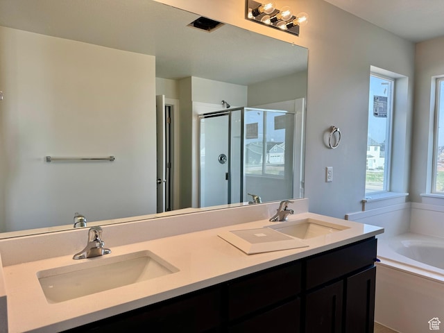 3807 W 1780 S Unit 213, Taylor, UT 84401 - bathroom with a shower stall, double vanity, and a bath