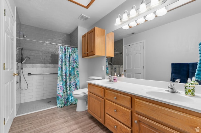429 W 90 N, American Fork, UT 84003 - full bath featuring tiled shower, wood finished floors, double vanity, and toilet