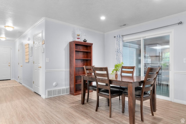 429 W 90 N, American Fork, UT 84003 - dining space with light wood-style floors, crown molding, and baseboards