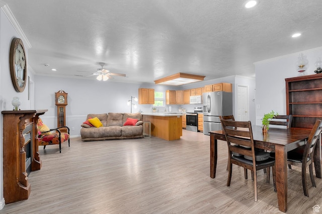 429 W 90 N, American Fork, UT 84003 - dining area with light wood-style floors, ceiling fan, crown molding, recessed lighting, and baseboards