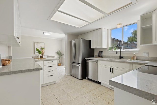 1064 E 200 N, Orem, UT 84097 - kitchen featuring stainless steel appliances, a sink, light tile patterned floors, white cabinetry, and light stone countertops