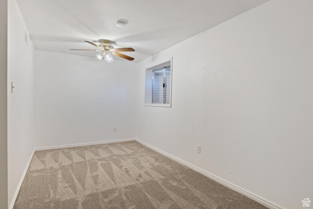 1064 E 200 N, Orem, UT 84097 - spare room featuring a ceiling fan, light colored carpet, baseboards, and a smoke detector