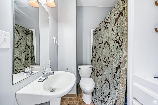 201 S 400 W, Logan, UT 84321 - full bath featuring toilet and tile patterned floors