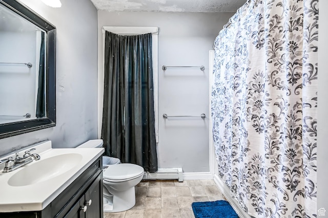 201 S 400 W, Logan, UT 84321 - bathroom with vanity, a baseboard heating unit, and a shower with curtain