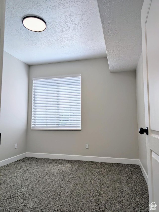 1030 N 995 W Unit 907, Orem, UT 84057 - unfurnished room with carpet floors, a textured ceiling, and baseboards