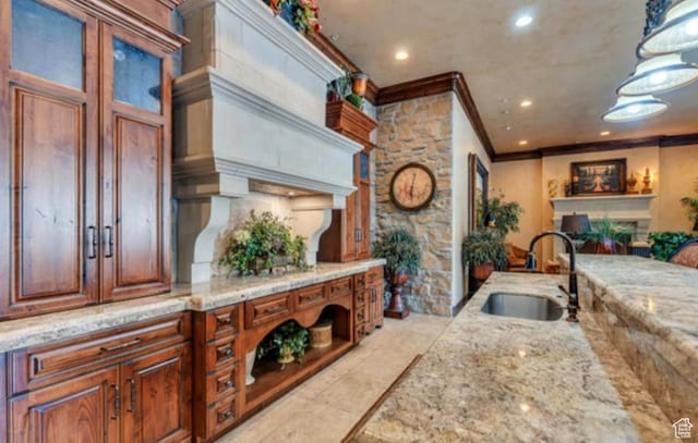 1030 N 995 W Unit 907, Orem, UT 84057 - kitchen with a sink, crown molding, light stone countertops, recessed lighting, and open floor plan