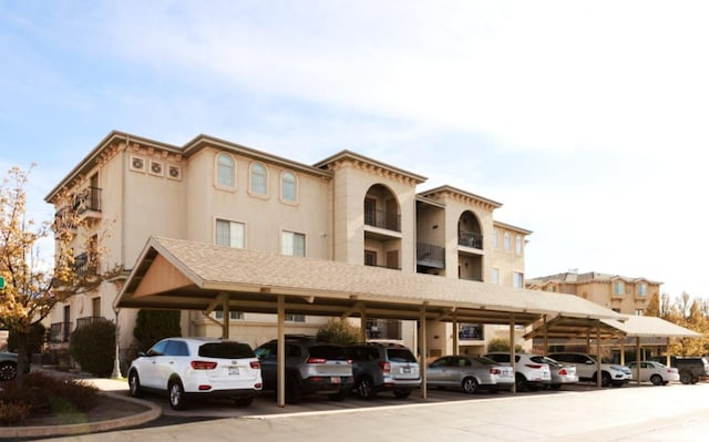 1030 N 995 W Unit 907, Orem, UT 84057 - view of building exterior with covered parking