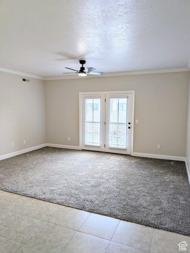 1030 N 995 W Unit 907, Orem, UT 84057 - carpeted spare room featuring a ceiling fan, ornamental molding, baseboards, a textured ceiling, and tile patterned floors