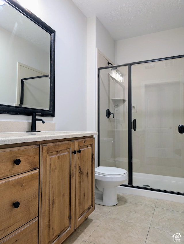 1030 N 995 W Unit 907, Orem, UT 84057 - full bathroom featuring a shower stall, vanity, and toilet