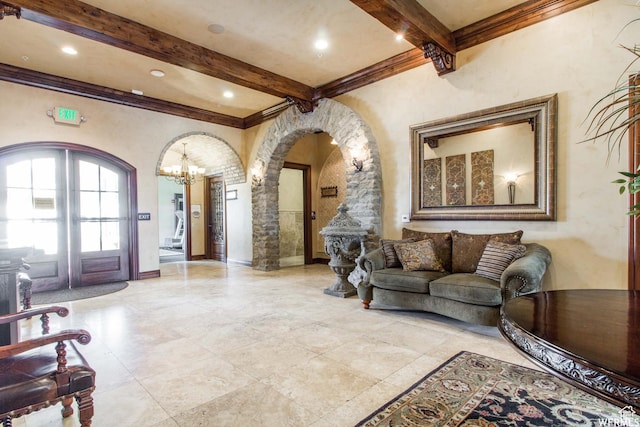 1030 N 995 W Unit 907, Orem, UT 84057 - living room featuring arched walkways, beamed ceiling, a chandelier, and ornamental molding