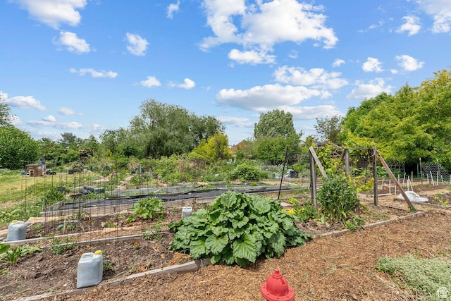 1411 S Utah St Unit 7, Salt Lake City, UT 84104 - view of yard featuring a garden and view of scattered trees