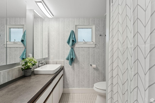 1411 S Utah St Unit 7, Salt Lake City, UT 84104 - full bath featuring wallpapered walls, toilet, healthy amount of natural light, tile patterned flooring, and vanity